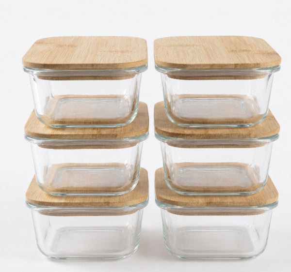Lunch box en verre sous vide et boîte de conservation micro-onde en verre borosilicate très résistant. Alternative écologique au tupperware classique, cette boîte hermétique possède un couvercle en bambou naturel et silicone étanche."